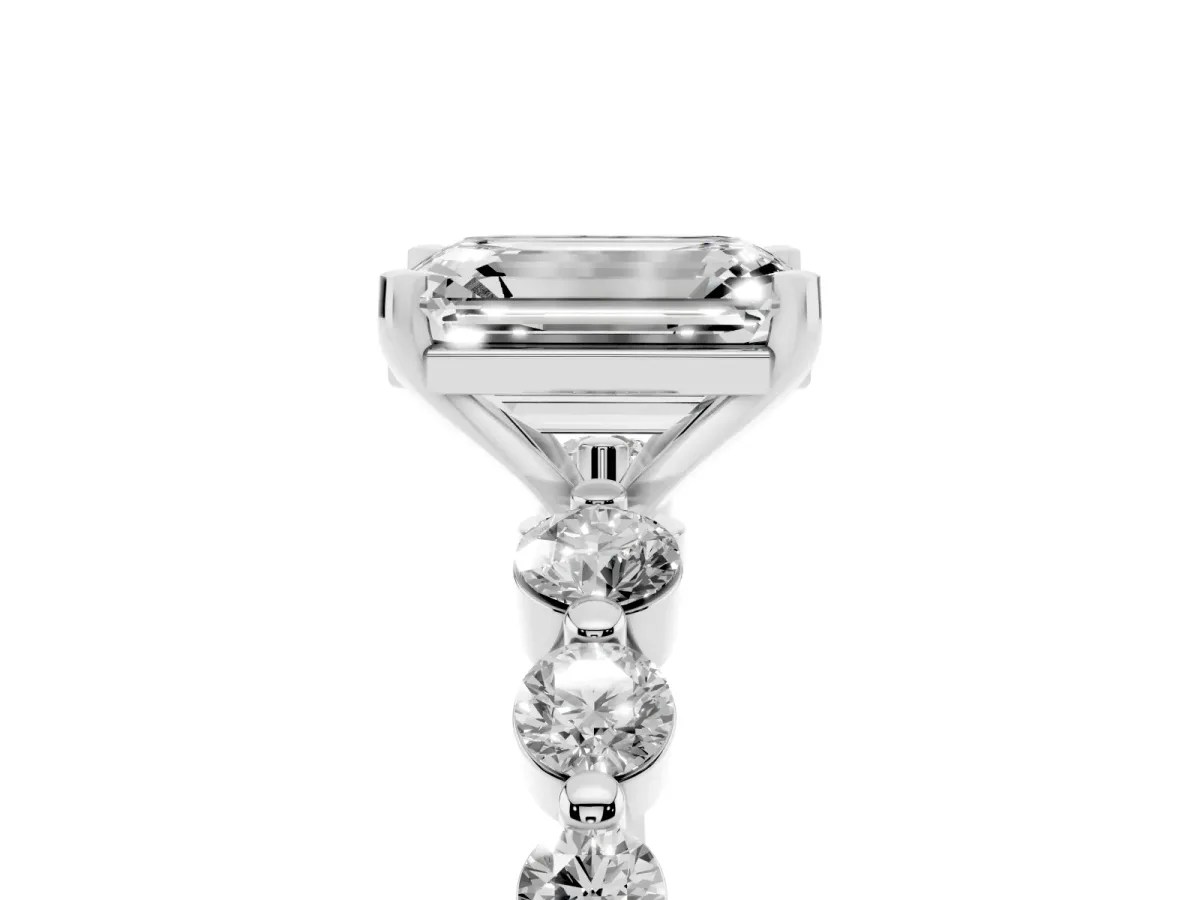 Emerald Cut Solitaire Diamond Ring with Pave Band and Four-Prong Setting Silver