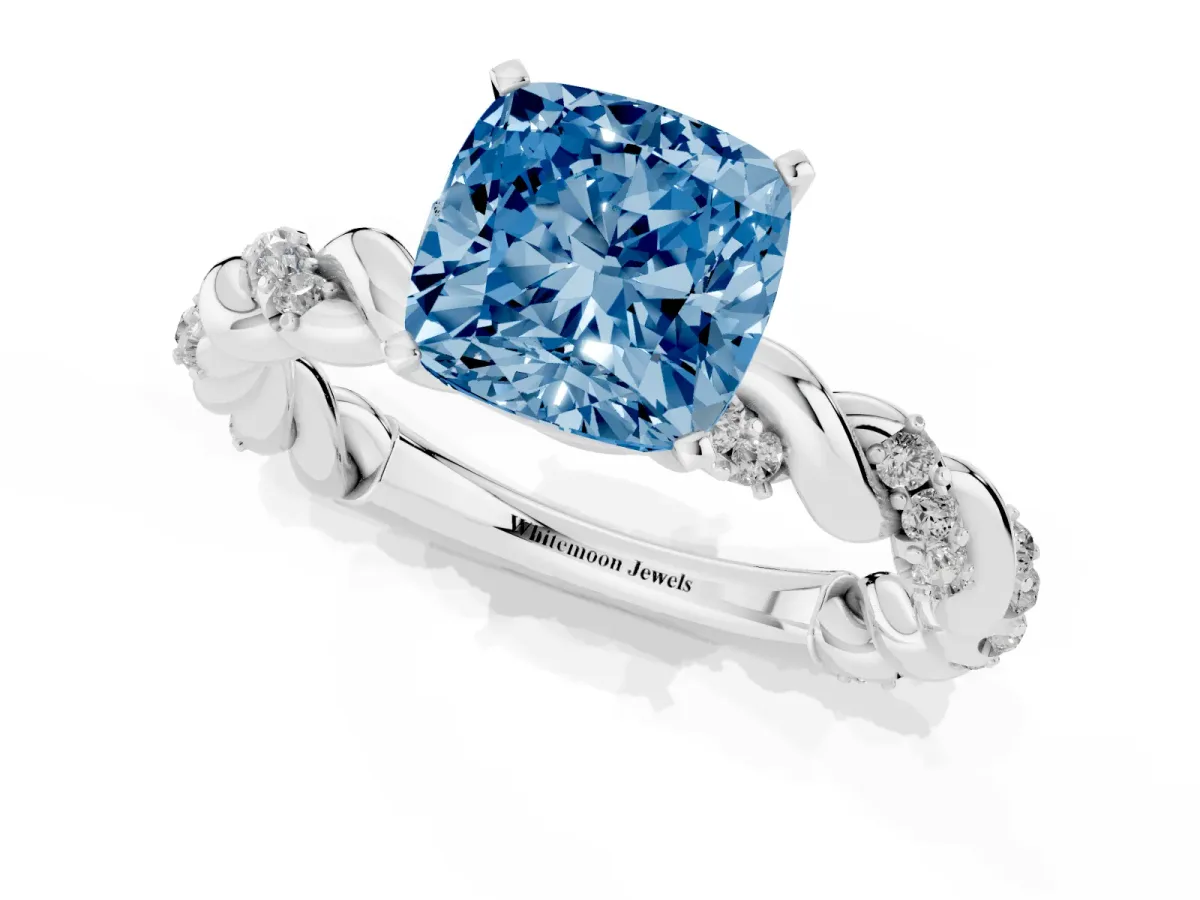 Fancy Blue Cushion Cut Diamond Solitaire Ring with Twisted Band and Pavé Accents Platinum