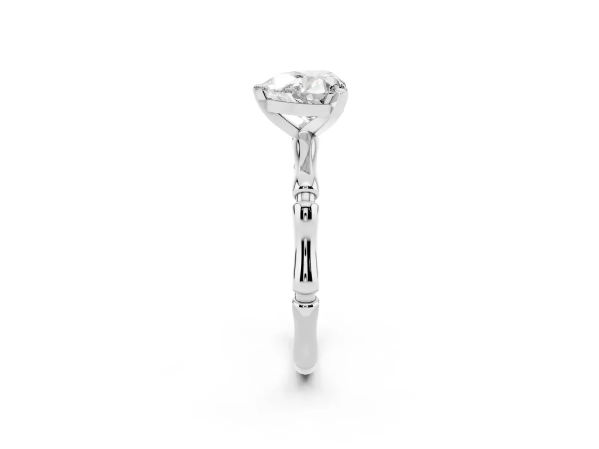 Heart Cut Solitaire Diamond Ring with Bamboo Band and Four-Prong Setting Platinum