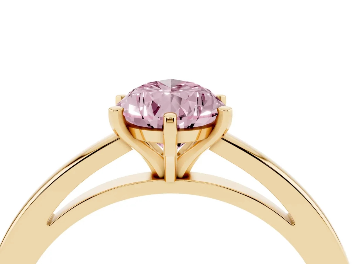 Fancy Pink Pear Cut Solitaire Diamond Engagement Ring with Four-Prong Setting on a Classic Band Yellow gold