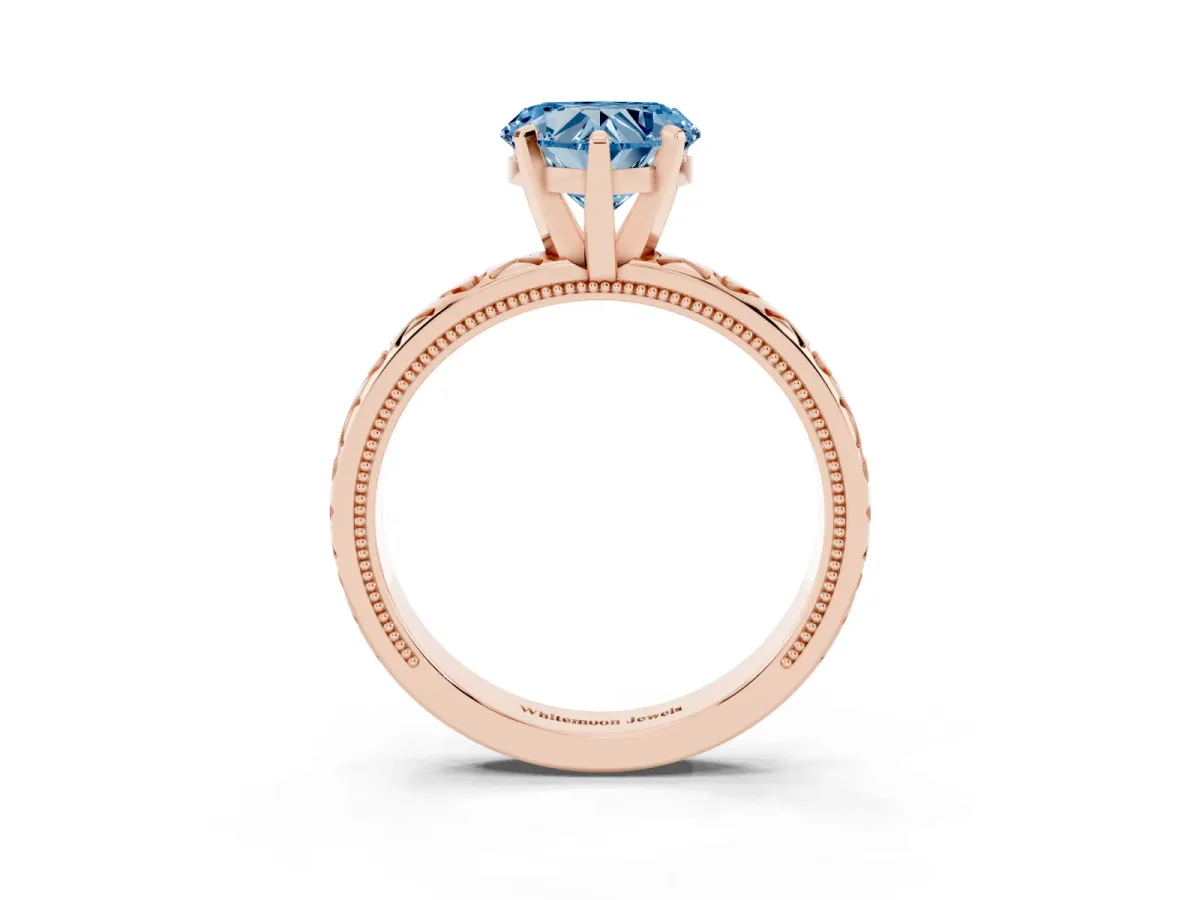 Fancy Blue Heart Cut Solitaire Diamond Engagement Ring with XO Engraved Band and Four-Prong Setting Rose gold