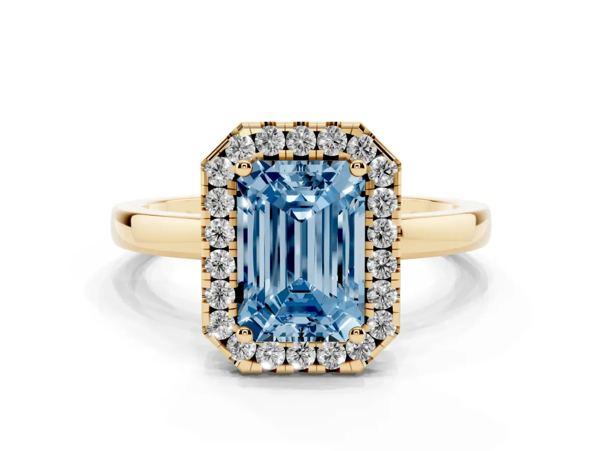 Fancy Blue Emerald Cut Halo Diamond Solitaire with Pavé Band and Four-Prong Setting Yellow gold