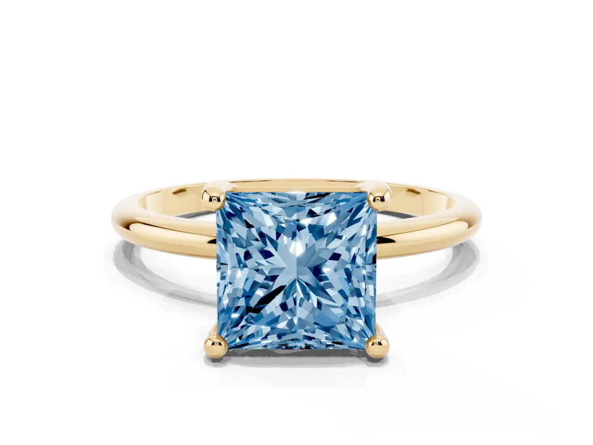 Fancy Blue Princess Cut Solitaire Diamond Ring with 4-Prong Setting on a Classic Band Yellow gold