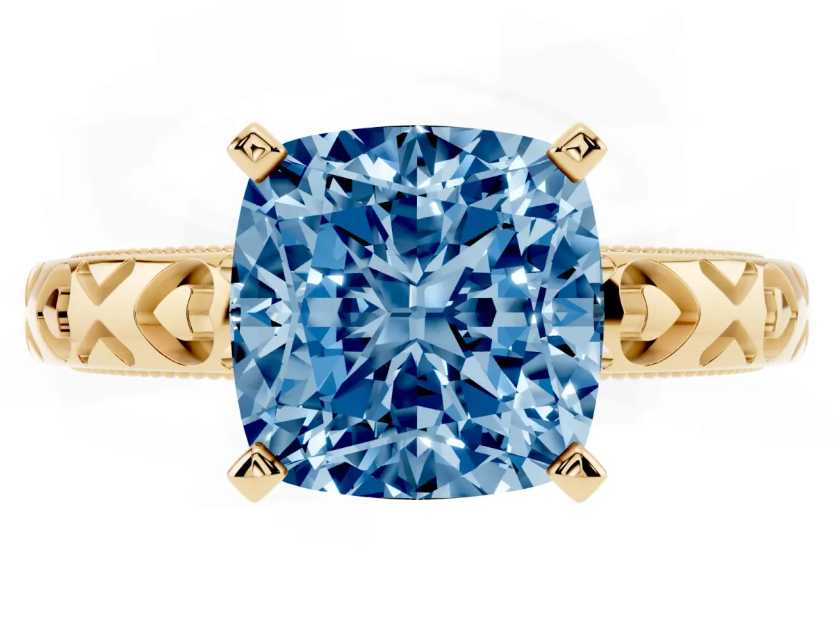 Fancy Blue Cushion Cut Solitaire Diamond Engagement Ring with XO Engraved Band and Four-Prong Setting Yellow gold