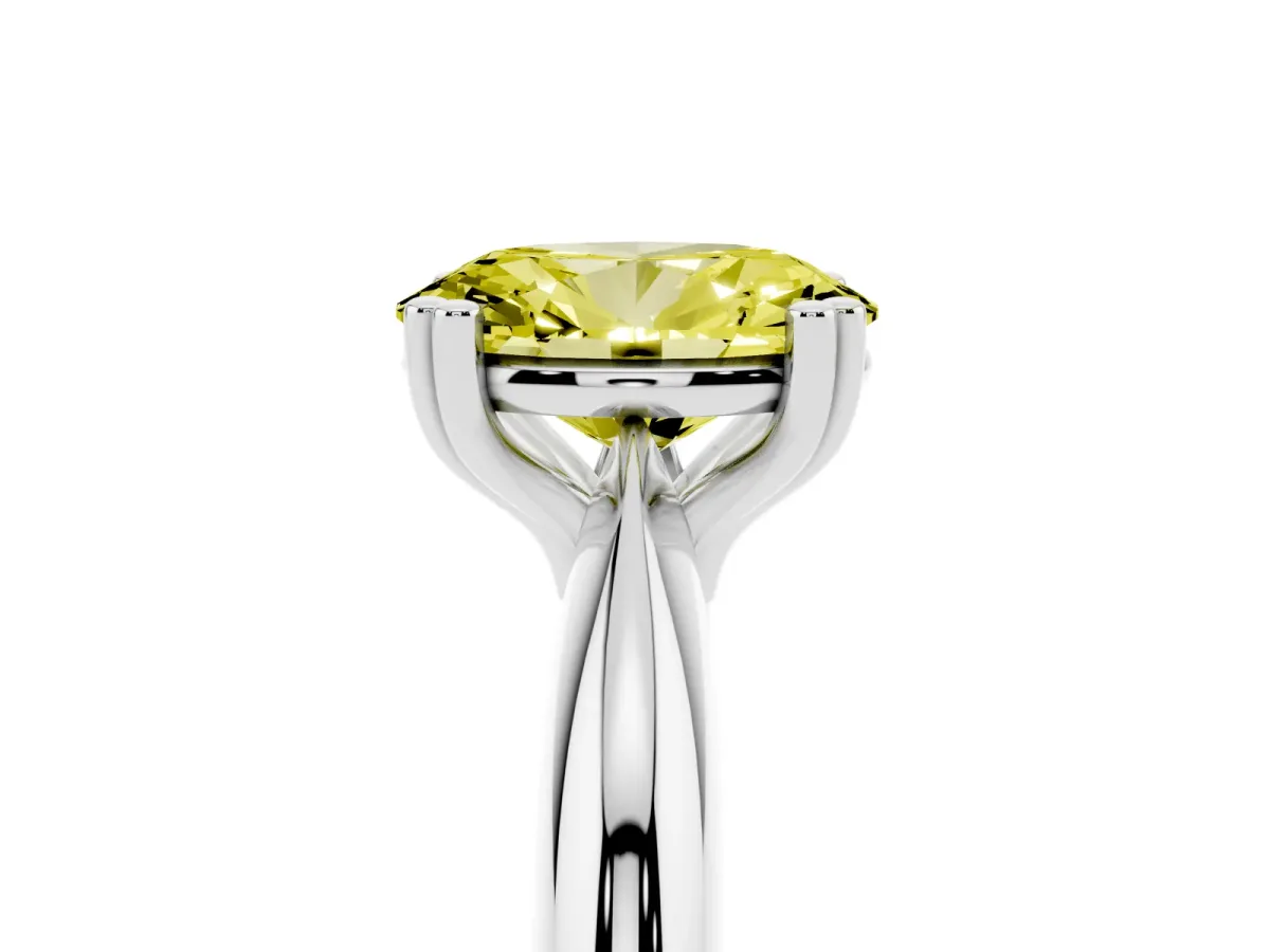 Fancy Yellow Oval Cut Cut Solitaire Engagement Ring with Tapered Band and Four-Prong Setting Silver