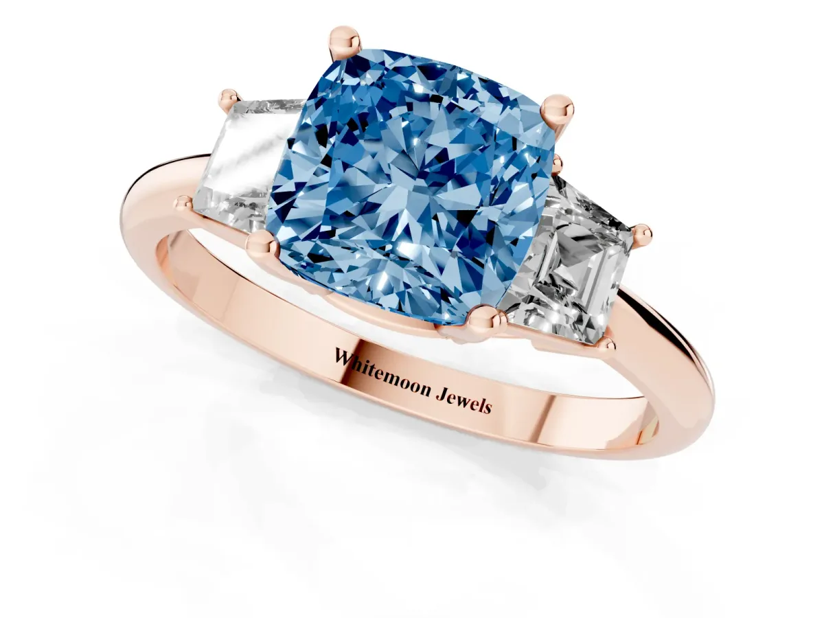 Fancy Blue Cushion Cut Diamond Three-Stone Ring with Trapezoid Side Stones and Prong Setting Rose gold
