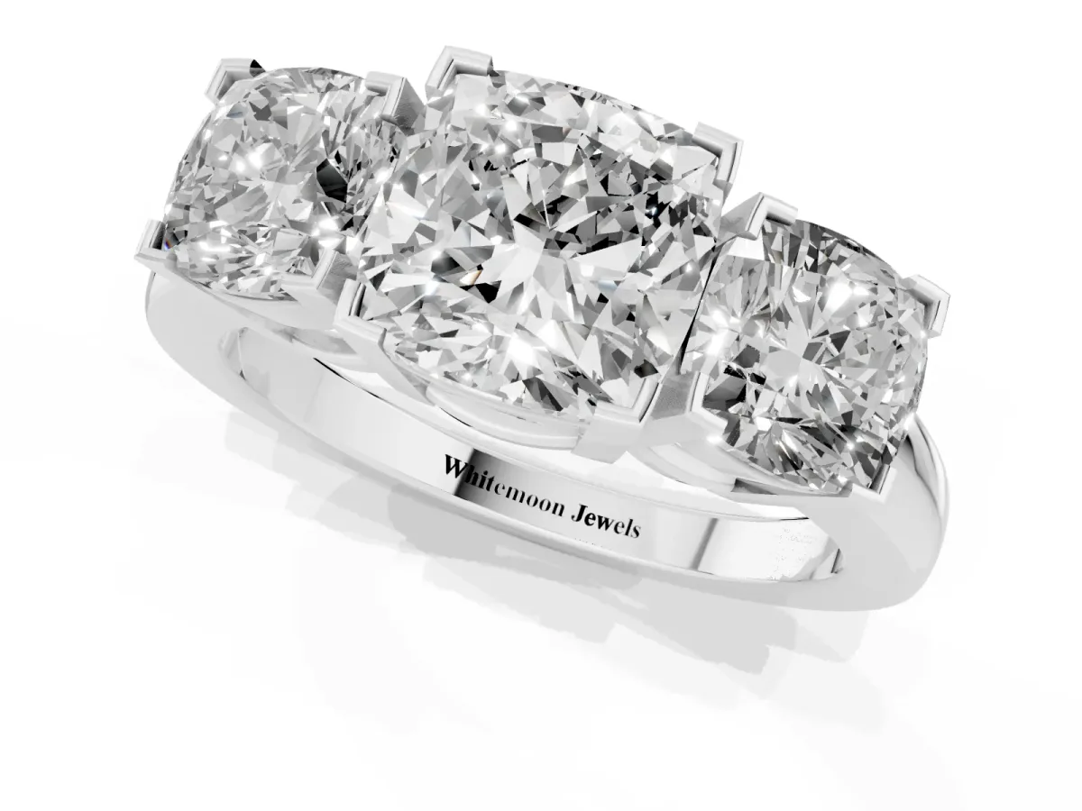 Three-Stone Cushion Cut Cut Diamond Ring with Channel Set Band and Four-Prong Setting Silver
