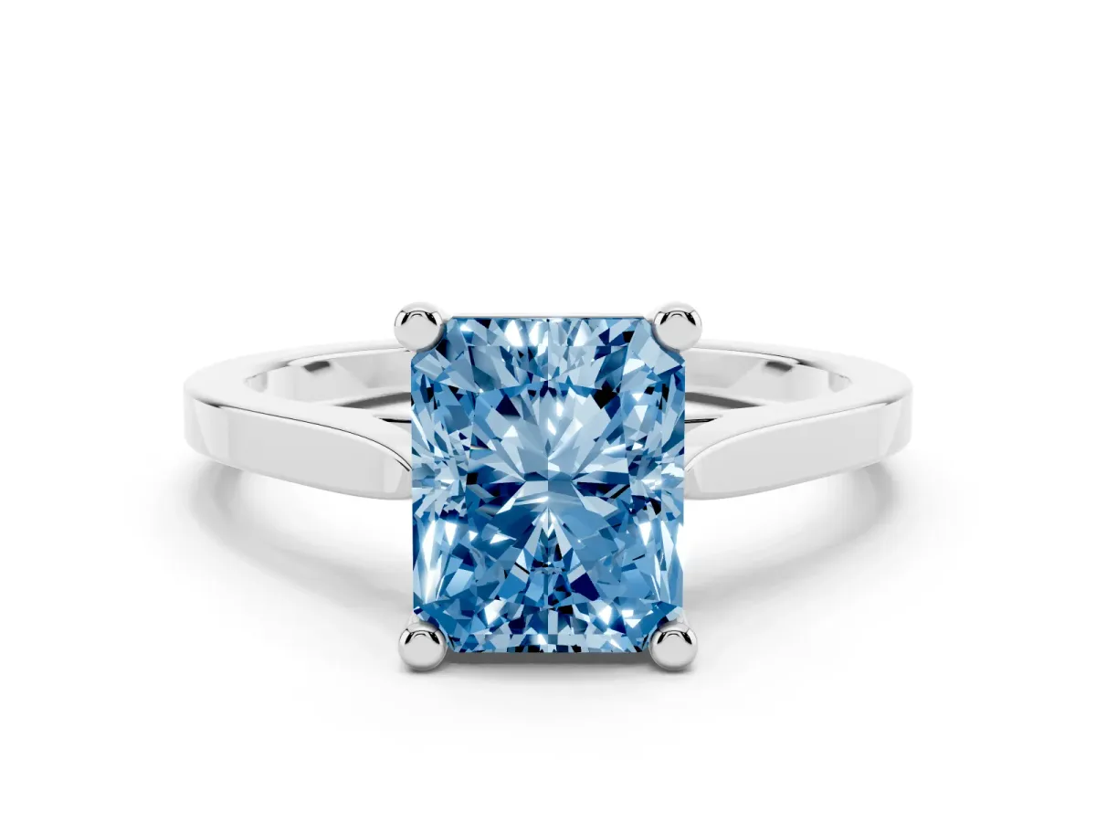 Fancy Blue Radiant Cut Solitaire Diamond Ring with Four-Prong Setting and Tapered Band Silver