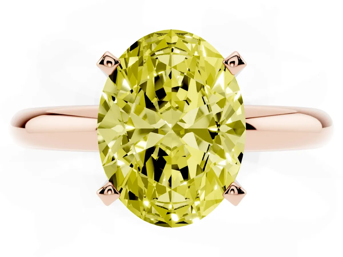 Fancy Yellow Oval Cut Diamond Solitaire Engagement Ring with Round Band and Four-Prong Setting Rose gold