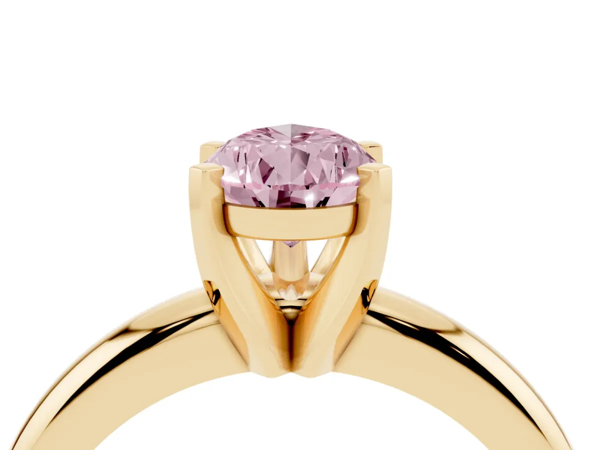 Fancy Pink Pear Cut Diamond Solitaire Engagement Ring with Round Band and Four-Prong Setting Yellow gold