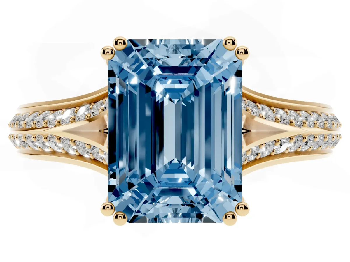 Fancy Blue Emerald Cut Diamond Split Shank Engagement Ring with Pavé Band Yellow gold