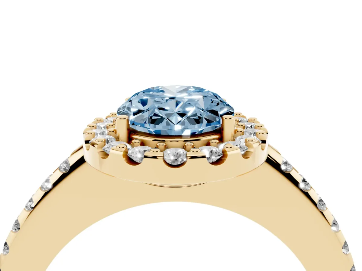 Fancy Blue Oval Cut Diamond Pavé Halo Ring with Four-Prong Setting Yellow gold