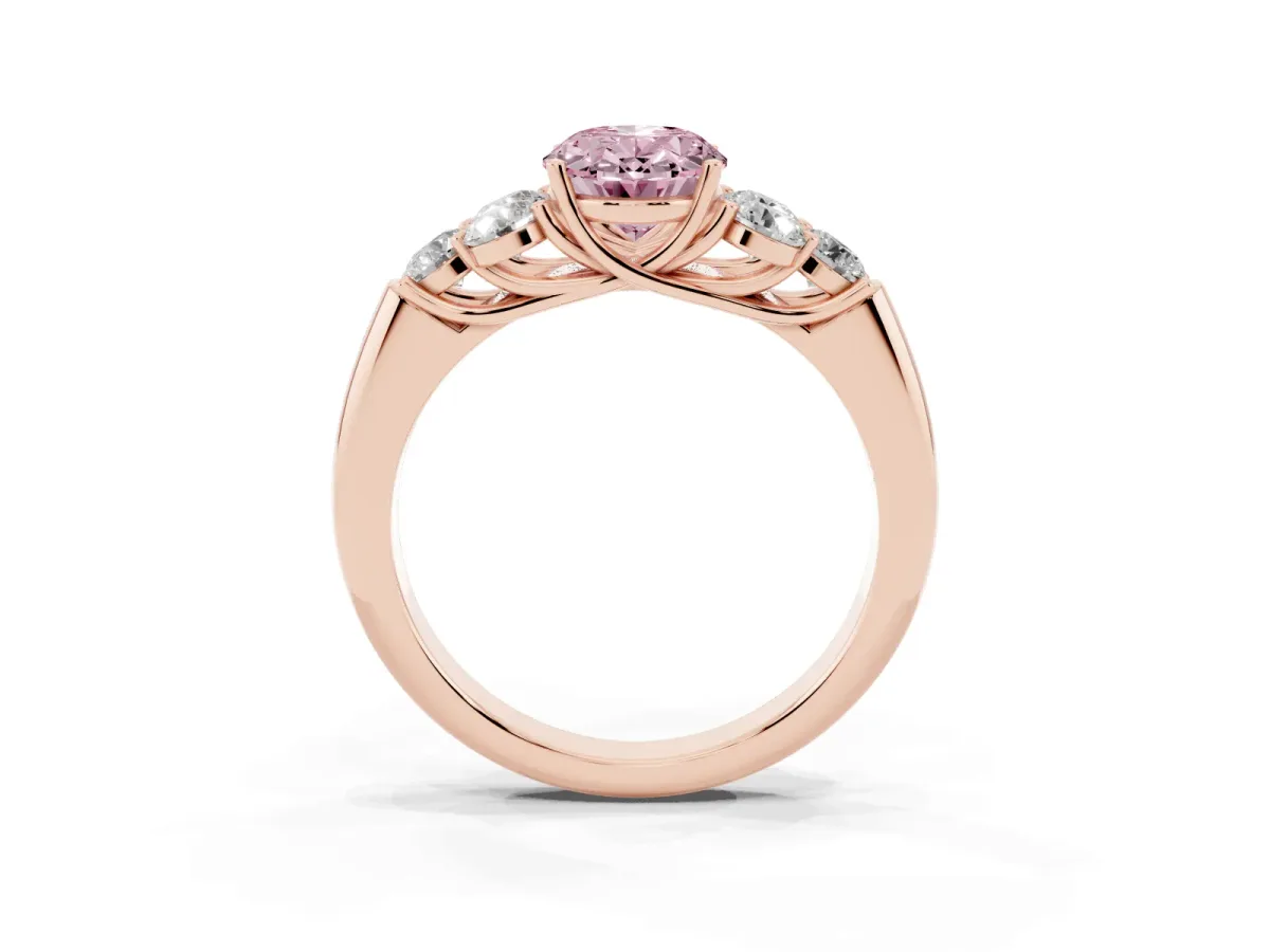 Fancy Pink Oval Cut Cut Diamond Cluster Ring with Round Accent Stones and Prong Setting on a Classic Band Rose gold