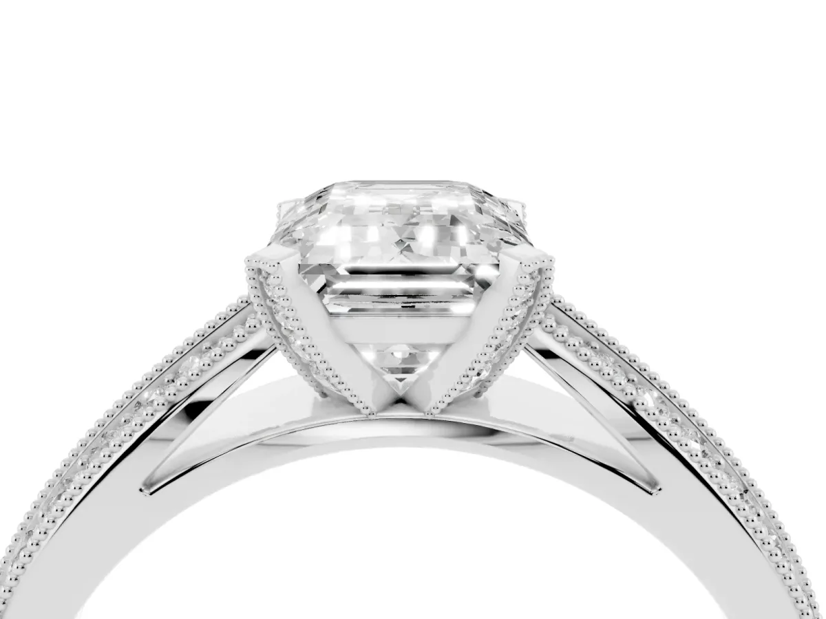 Emerald Cut Diamond Solitaire Ring with Milgrain Round Pavé Band and Prong Setting Platinum