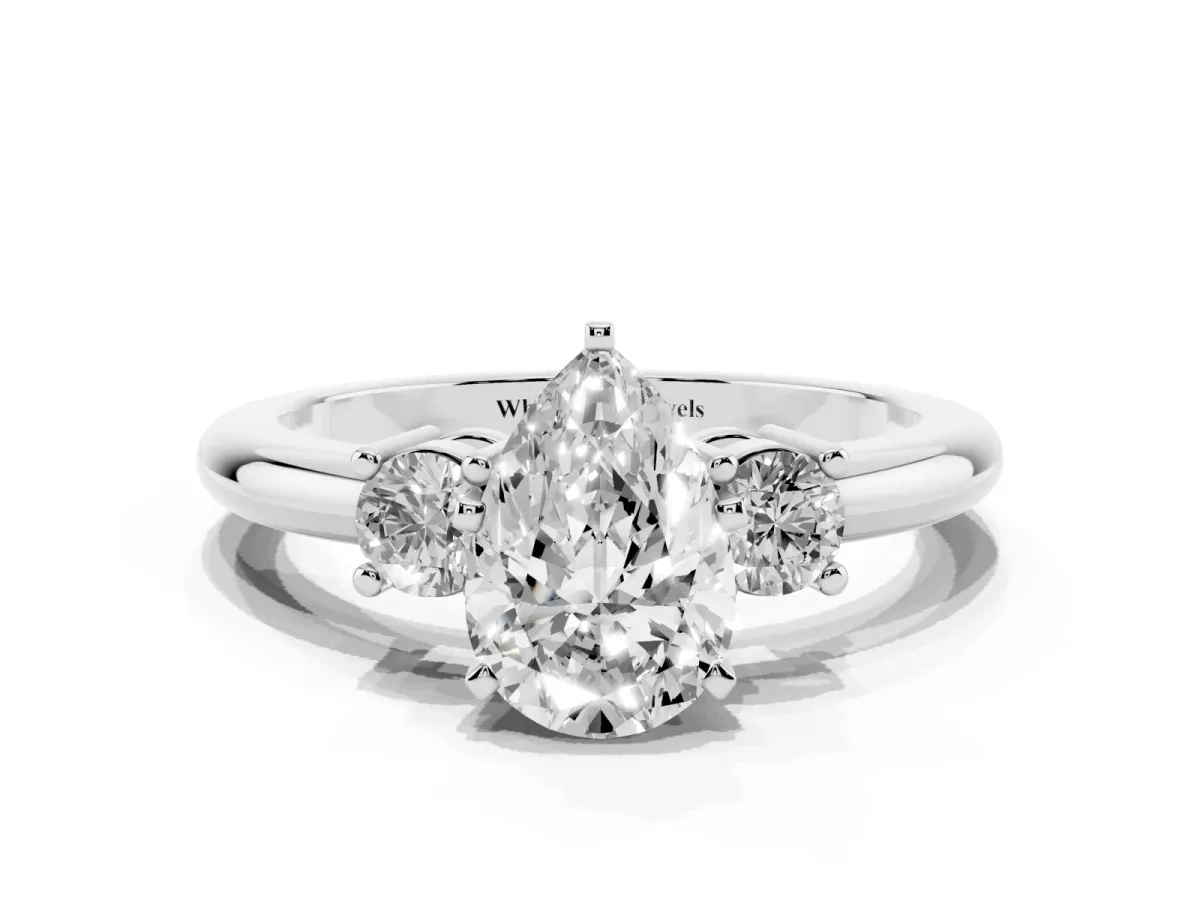 Three-Stone Pear Cut Cut Diamond Solitaire with Prong Setting and Classic Band Platinum