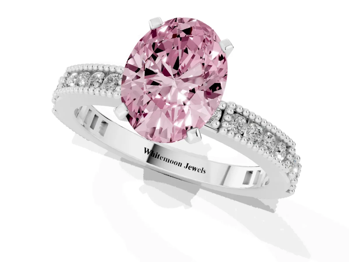 Fancy Pink Oval Cut Solitaire with Pavé Band and Four-Prong Setting Silver