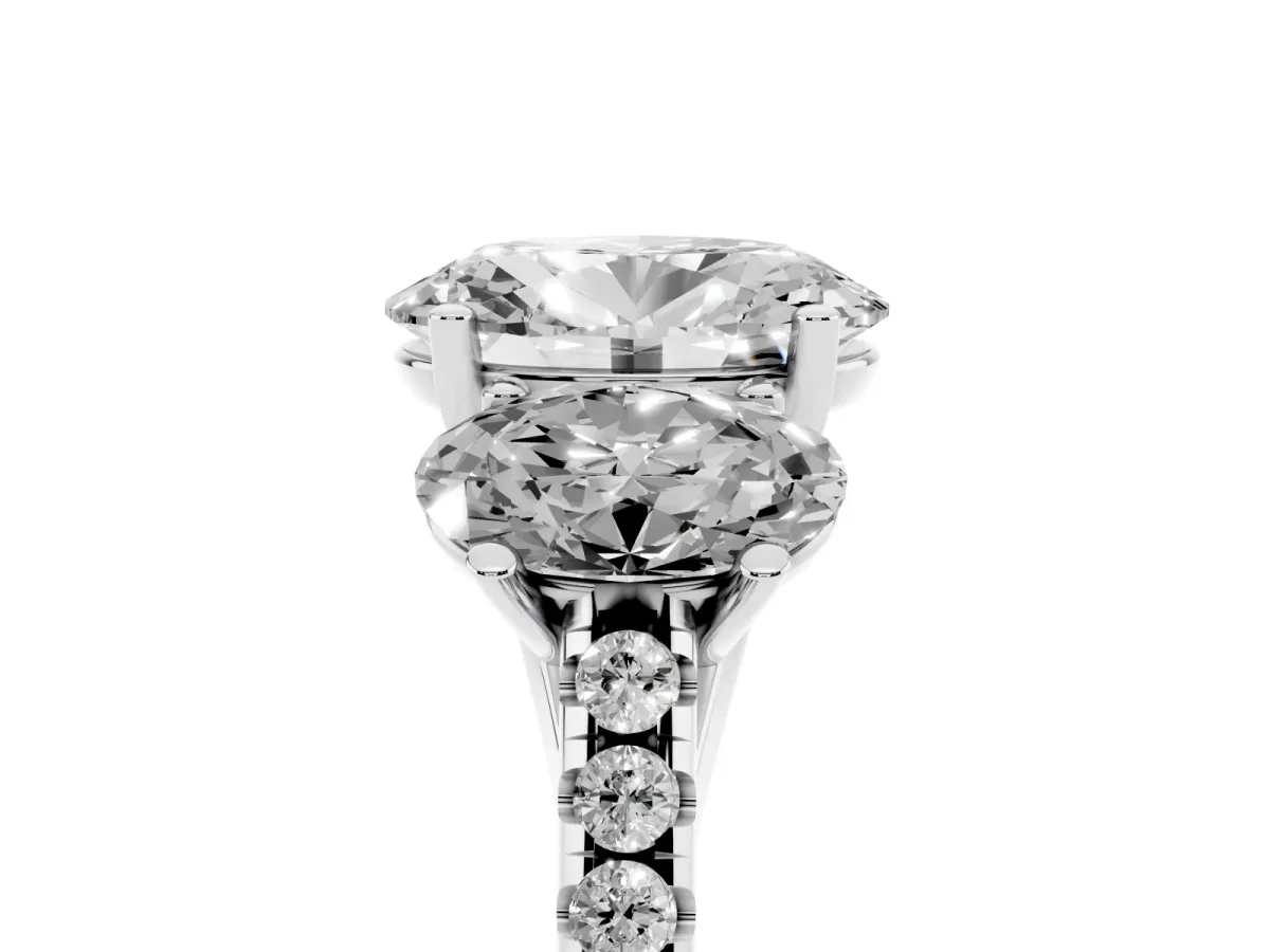 Three-Stone Oval Cut Diamond Ring with Round Pavé Band and Prong Setting Platinum