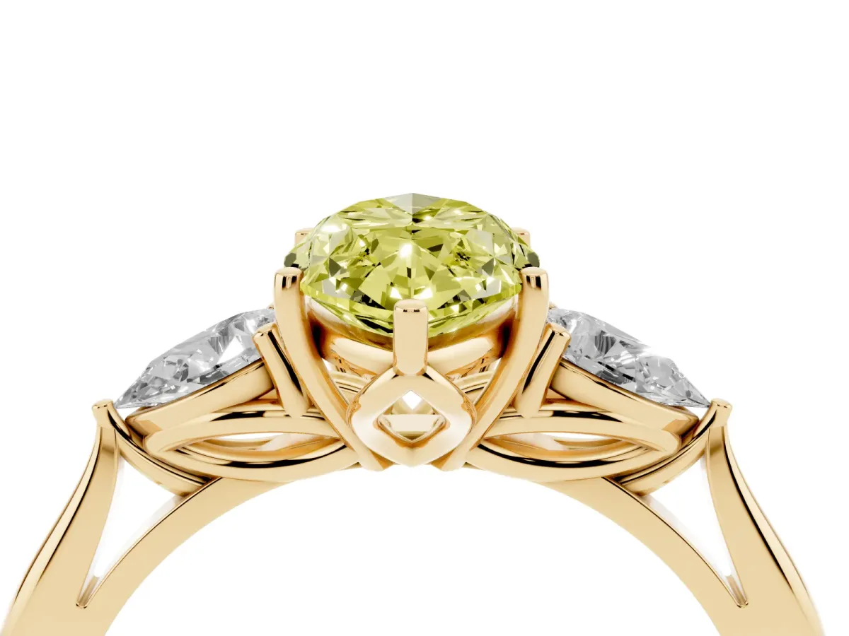 Fancy Yellow Three-Stone Marquise Cut Diamond Ring with Pear Side Stones in Four-Prong Setting Yellow gold