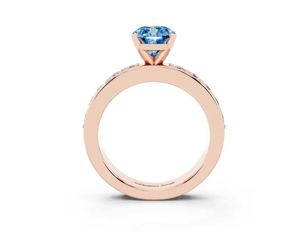 Fancy Blue Cushion Cut Diamond Engagement Ring with Channel Set Round Band and Prong Setting Rose gold