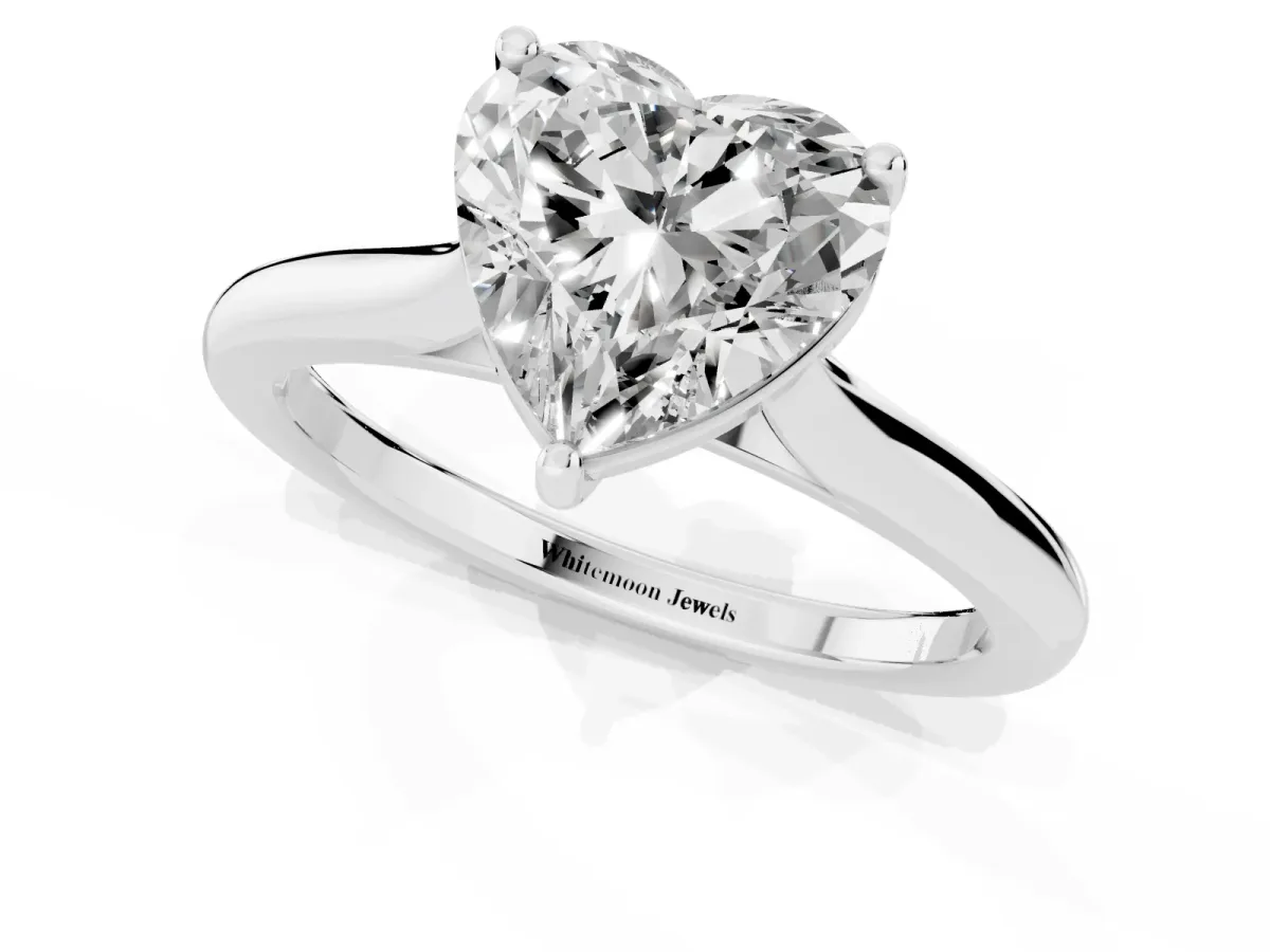 Heart Cut Cut Solitaire Ring with Cathedral Band and Four-Prong Setting Platinum