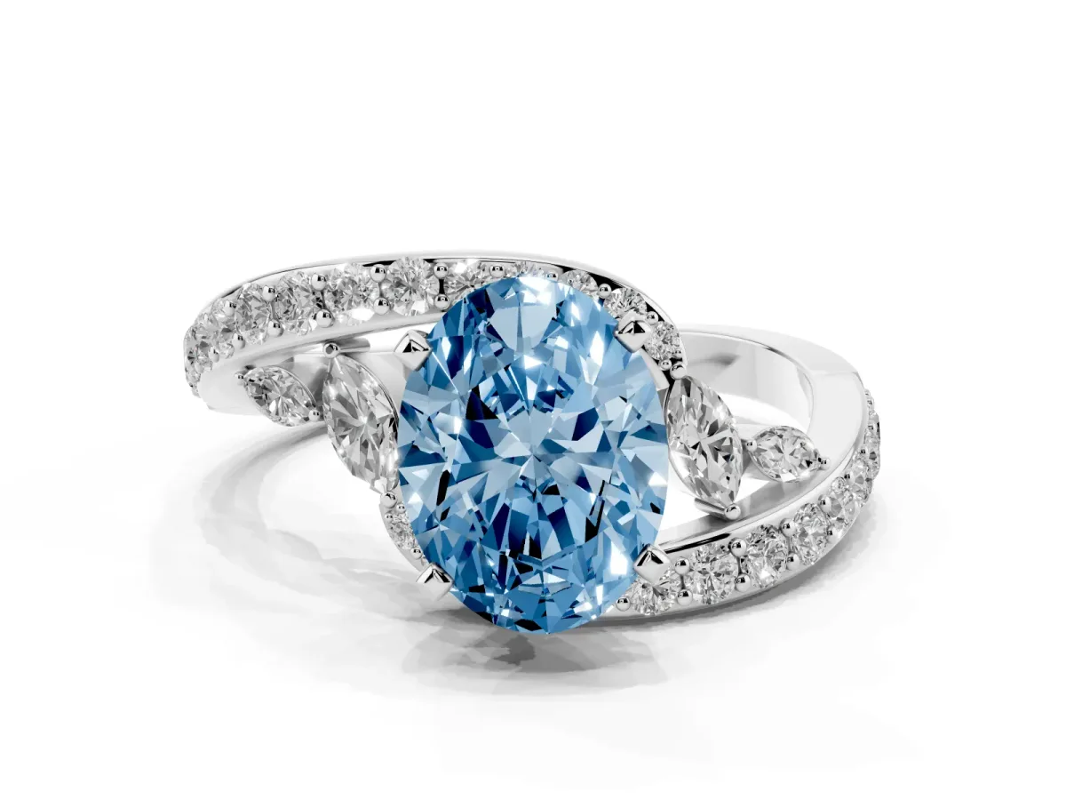 Fancy Blue Oval Cut Solitaire with Pavé Twist Band and Four-Prong Setting Silver