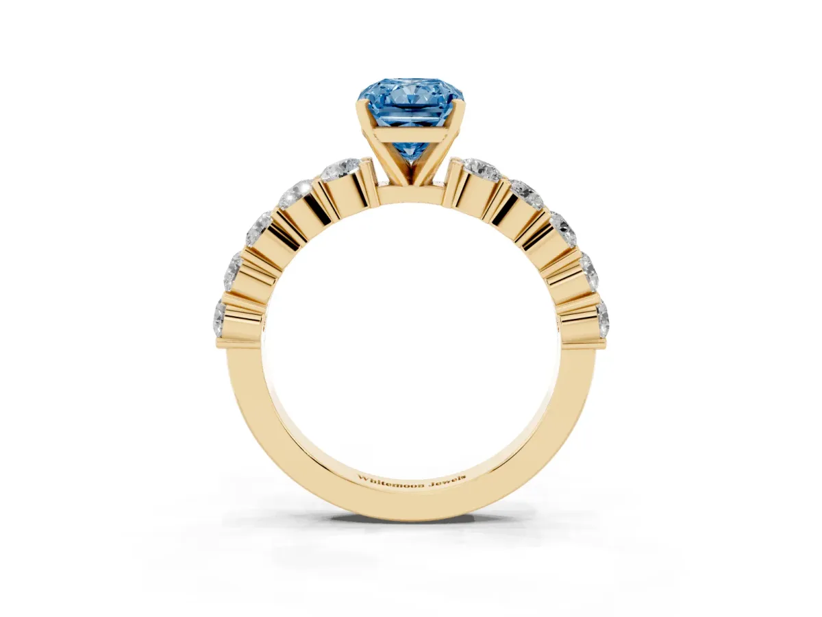 Fancy Blue Radiant Cut Diamond Solitaire Ring with Shared Prong Round Side Stones Yellow gold