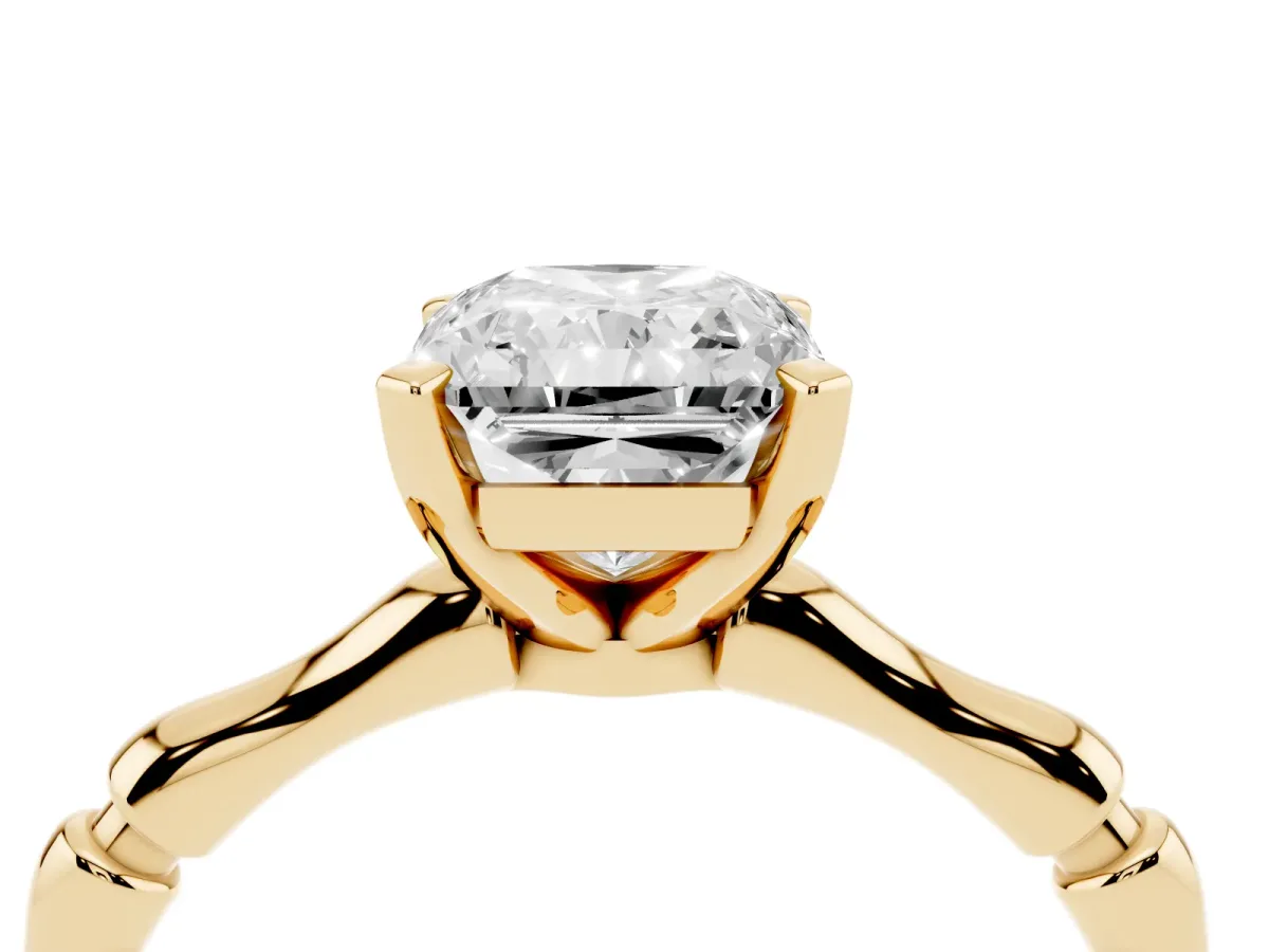 Radiant Cut Solitaire Diamond Ring with Bamboo Band and Four-Prong Setting Yellow gold