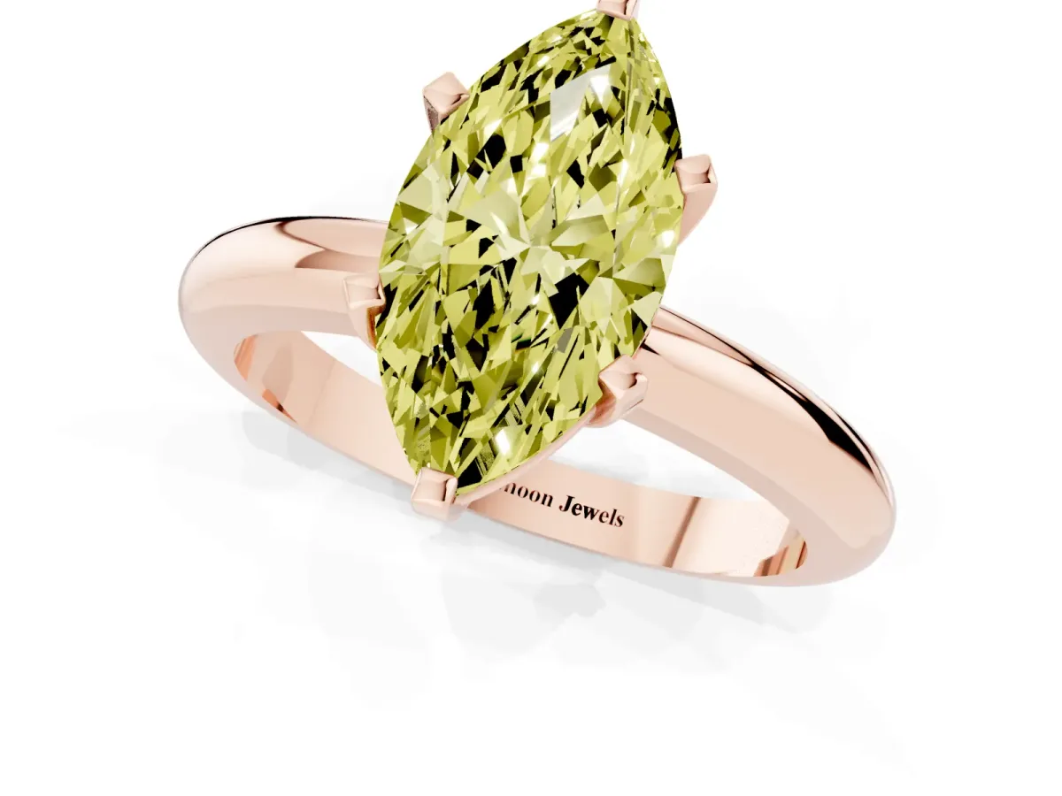 Fancy Yellow Marquise Cut Diamond Solitaire Engagement Ring with Round Band and Four-Prong Setting Rose gold