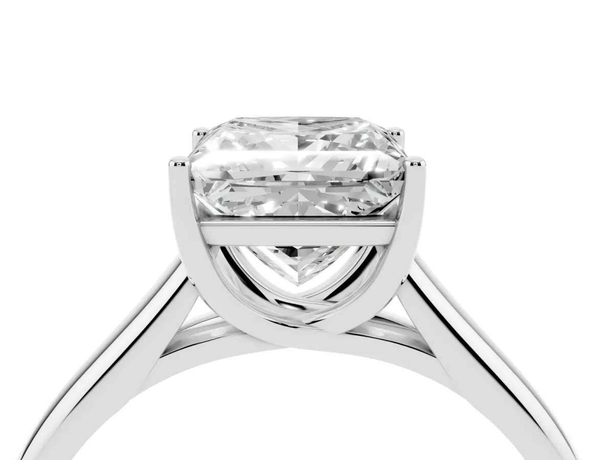 Princess Cut Solitaire Engagement Ring with Tapered Band and Four-Prong Setting Silver