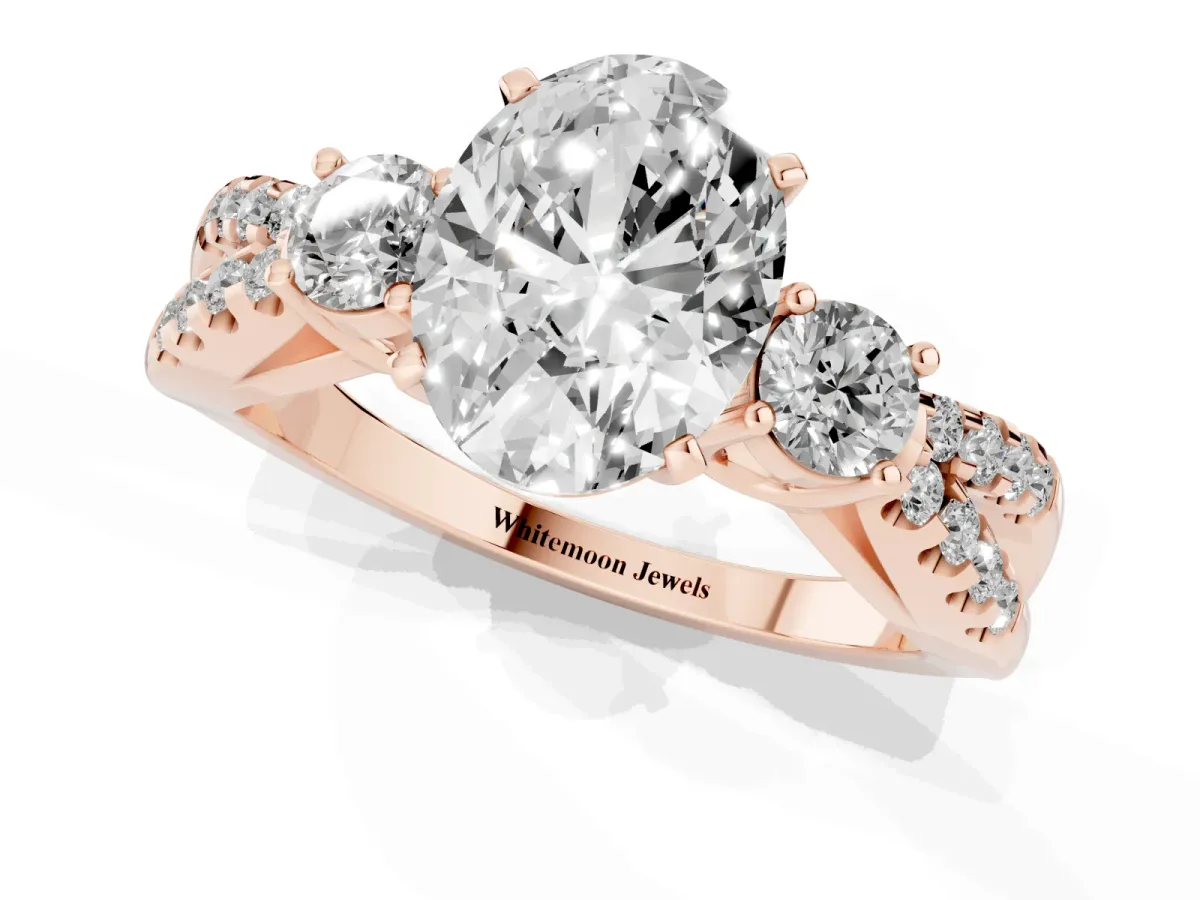 Oval Cut Diamond Three-Stone Ring with Pavé Split Shank and Four-Prong Setting Rose gold