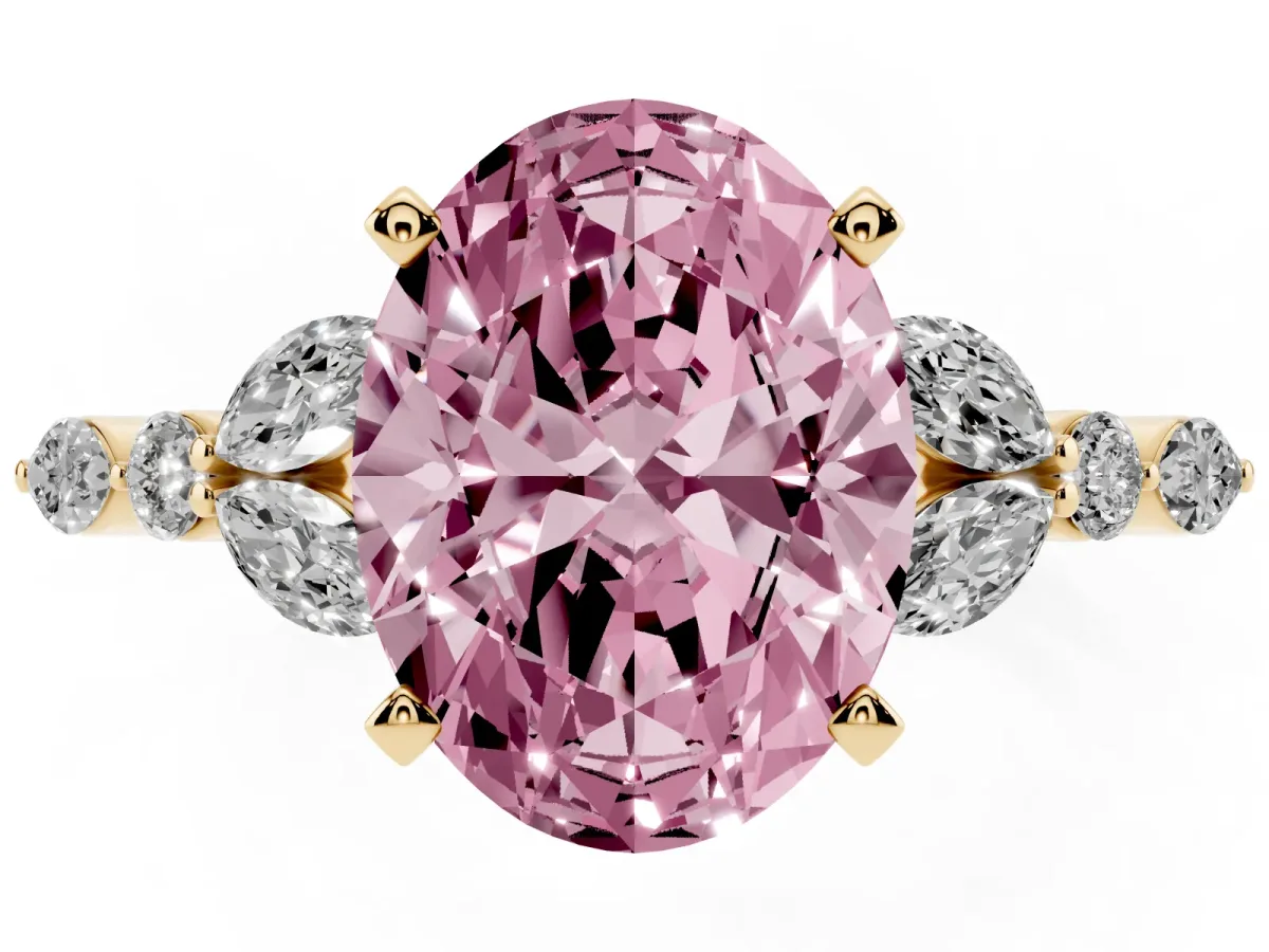 Fancy Pink Oval Cut Diamond Solitaire Ring with Side Stones and Four-Prong Setting Yellow gold