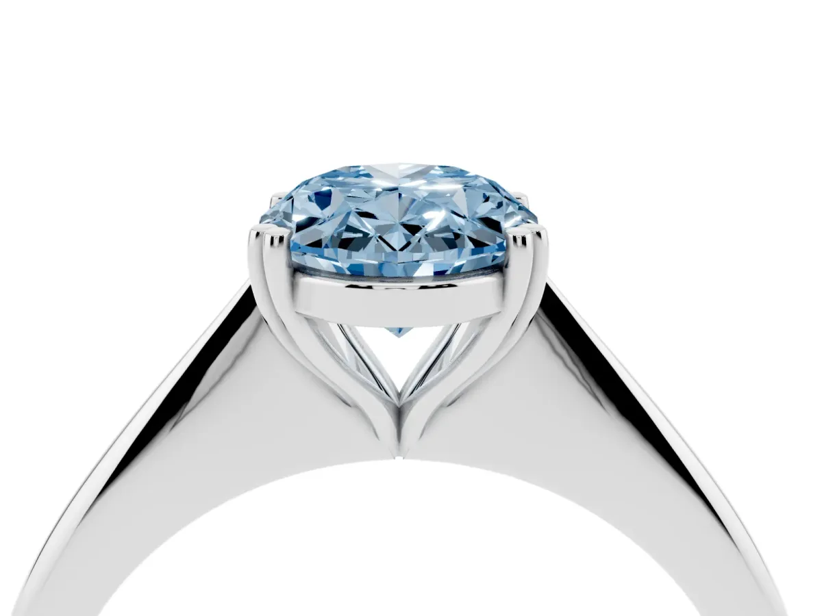 Fancy Blue Oval Cut Solitaire Diamond Ring with Six-Prong Setting and Classic Band Silver