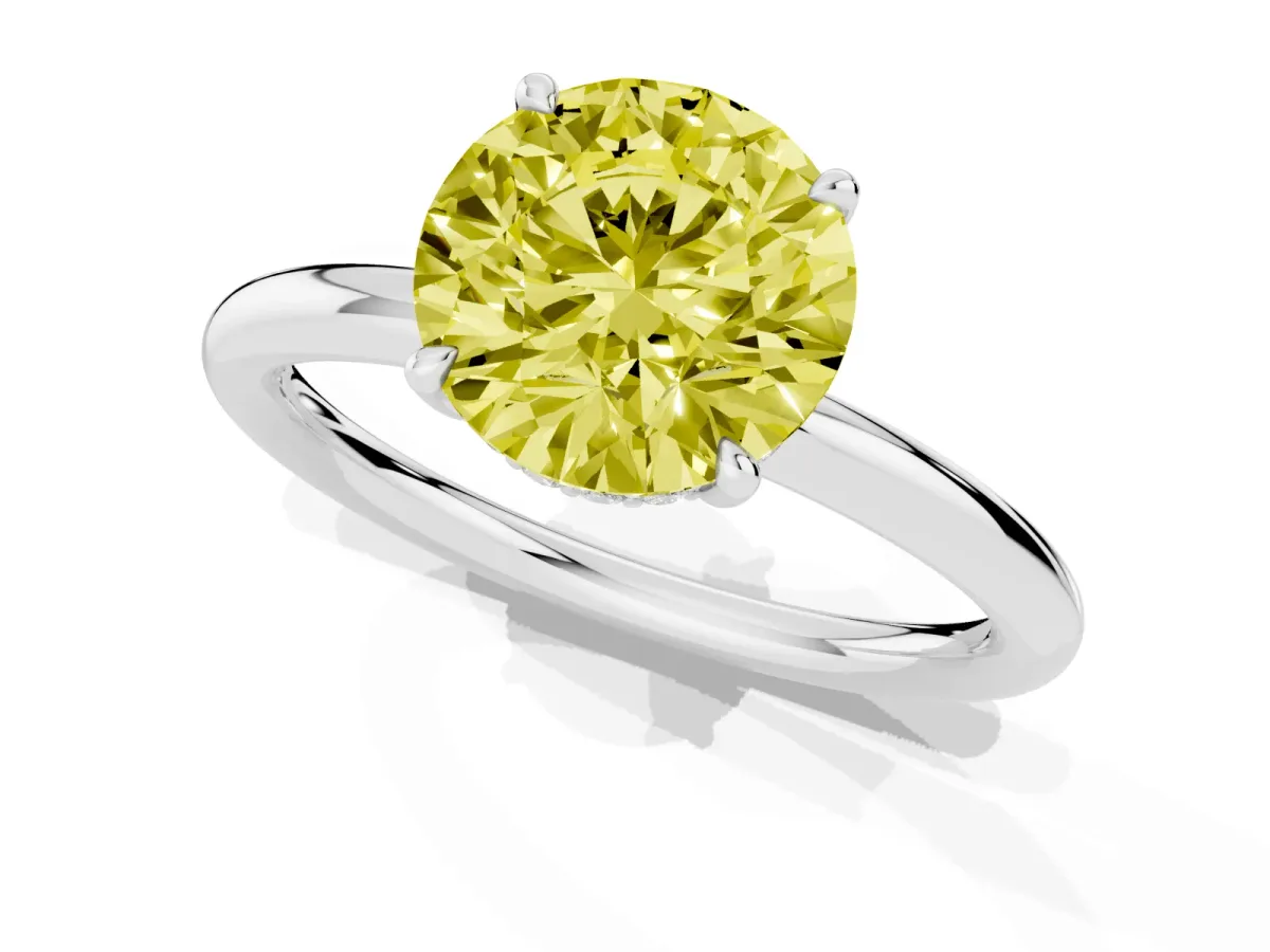 Fancy Yellow Round Cut Diamond Solitaire Ring with Thin Band and Four-Prong Setting Platinum