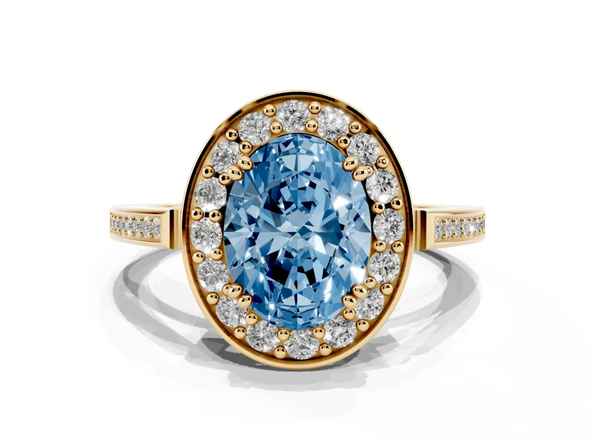 Fancy Blue Oval Cut Diamond Halo Ring with Split Shank and Four-Prong Setting Yellow gold