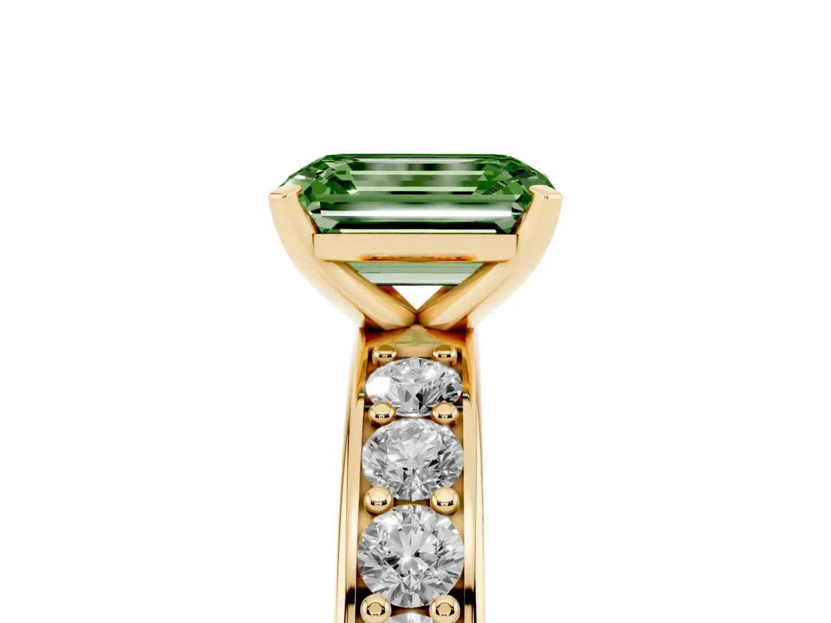 Fancy Green Emerald Cut Diamond Engagement Ring with Channel Set Round Band and Prong Setting Yellow gold