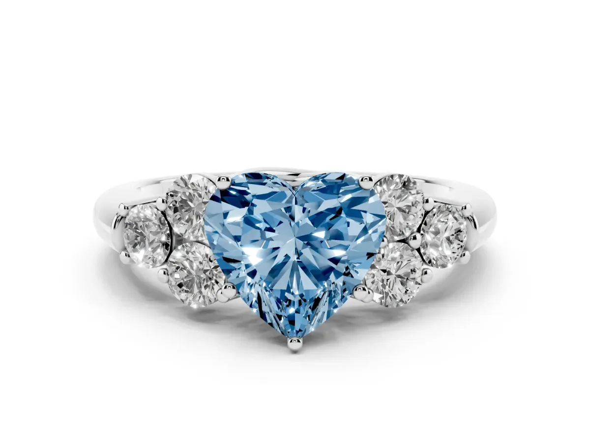 Fancy Blue Heart Cut Cut Diamond Cluster Ring with Round Accent Stones and Prong Setting on a Classic Band White gold