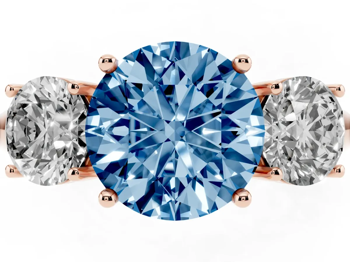 Fancy Blue Three-Stone Round Cut Cut Diamond Engagement Ring with Prong Setting on a White Gold Band Rose gold