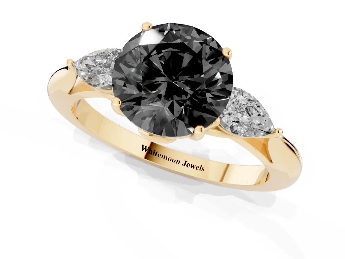 Fancy Black Three-Stone Round Cut Brilliant Diamond Solitaire Ring with Tapered Band and Four-Prong Setting Yellow gold