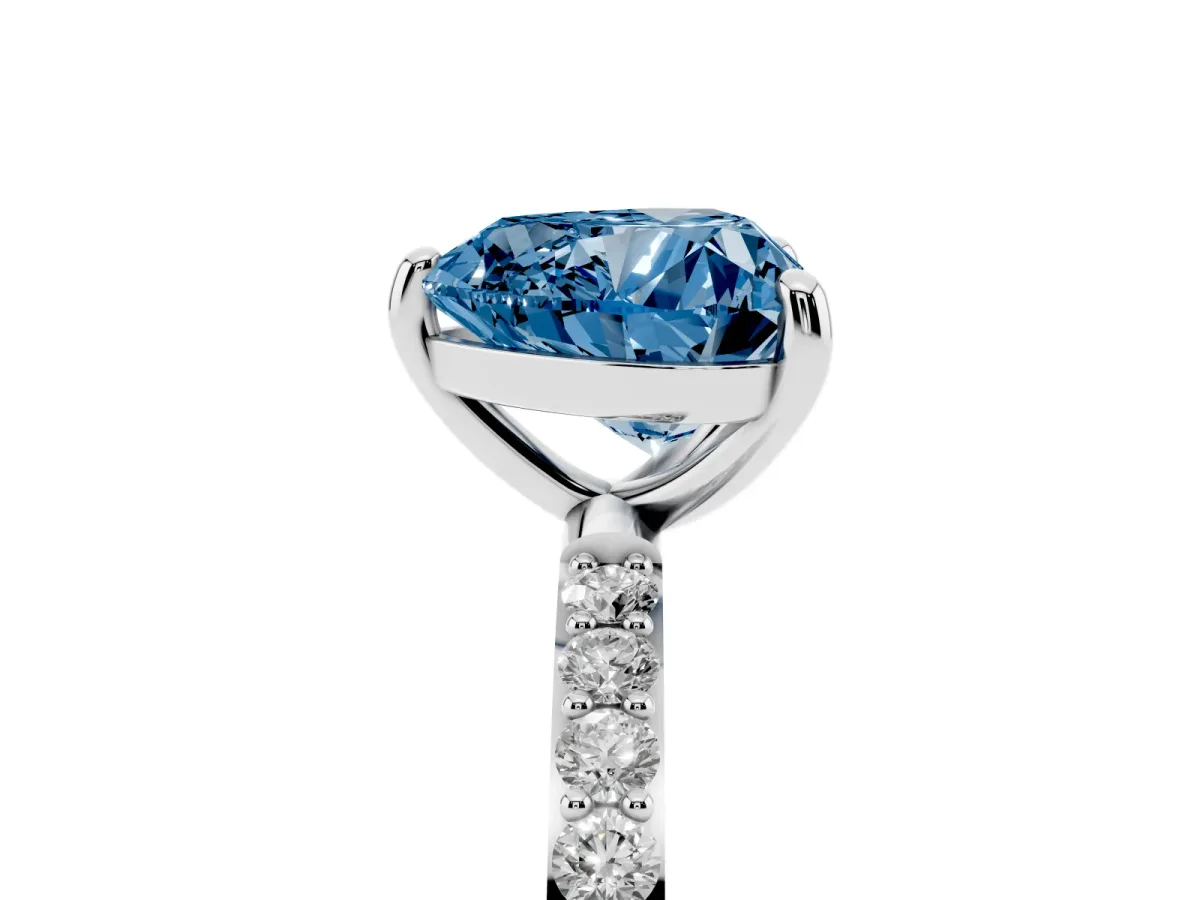 Fancy Blue Heart Cut Diamond Solitaire Ring with Round Pavé Band and Prong Setting Silver