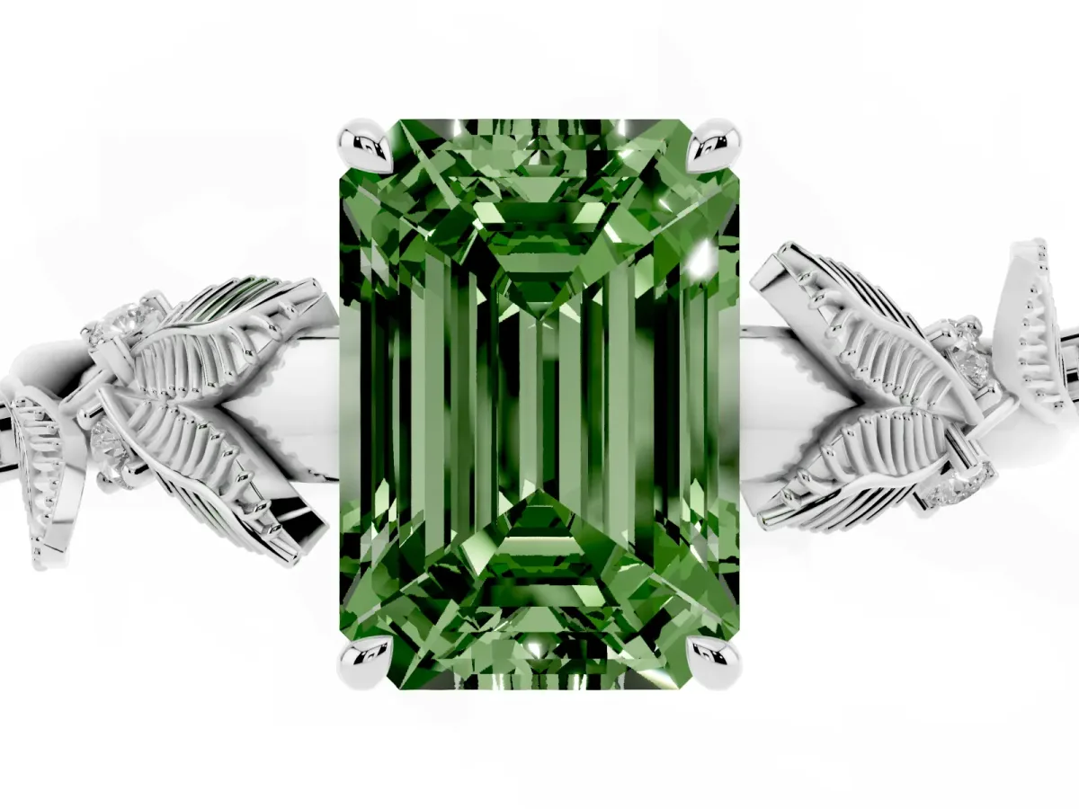 Fancy Green Emerald Cut Diamond Solitaire Ring with Leaf Motif Band and Four-Prong Setting Silver