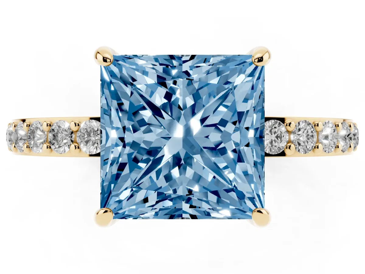 Fancy Blue Princess Cut Diamond Solitaire Engagement Ring with Pavé Band and Four-Prong Setting Yellow gold