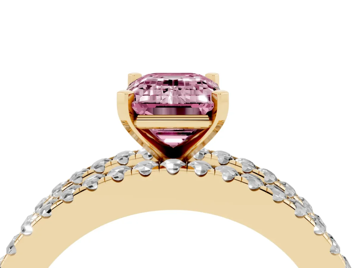 Fancy Pink Emerald Cut Diamond Solitaire Ring with Pavé and Channel Set Band Yellow gold