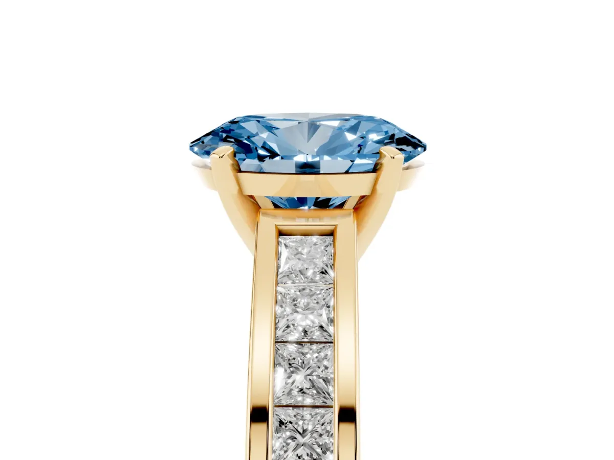 Fancy Blue Oval Cut Solitaire Diamond Ring with Channel-Set Band and Four-Prong Setting Yellow gold