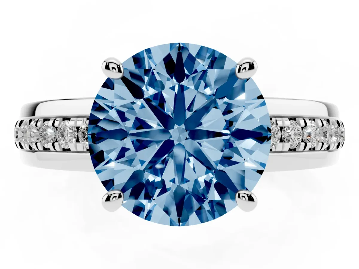 Fancy Blue Round Cut Solitaire Diamond Ring with Channel Set Band and Six-Prong Setting Silver