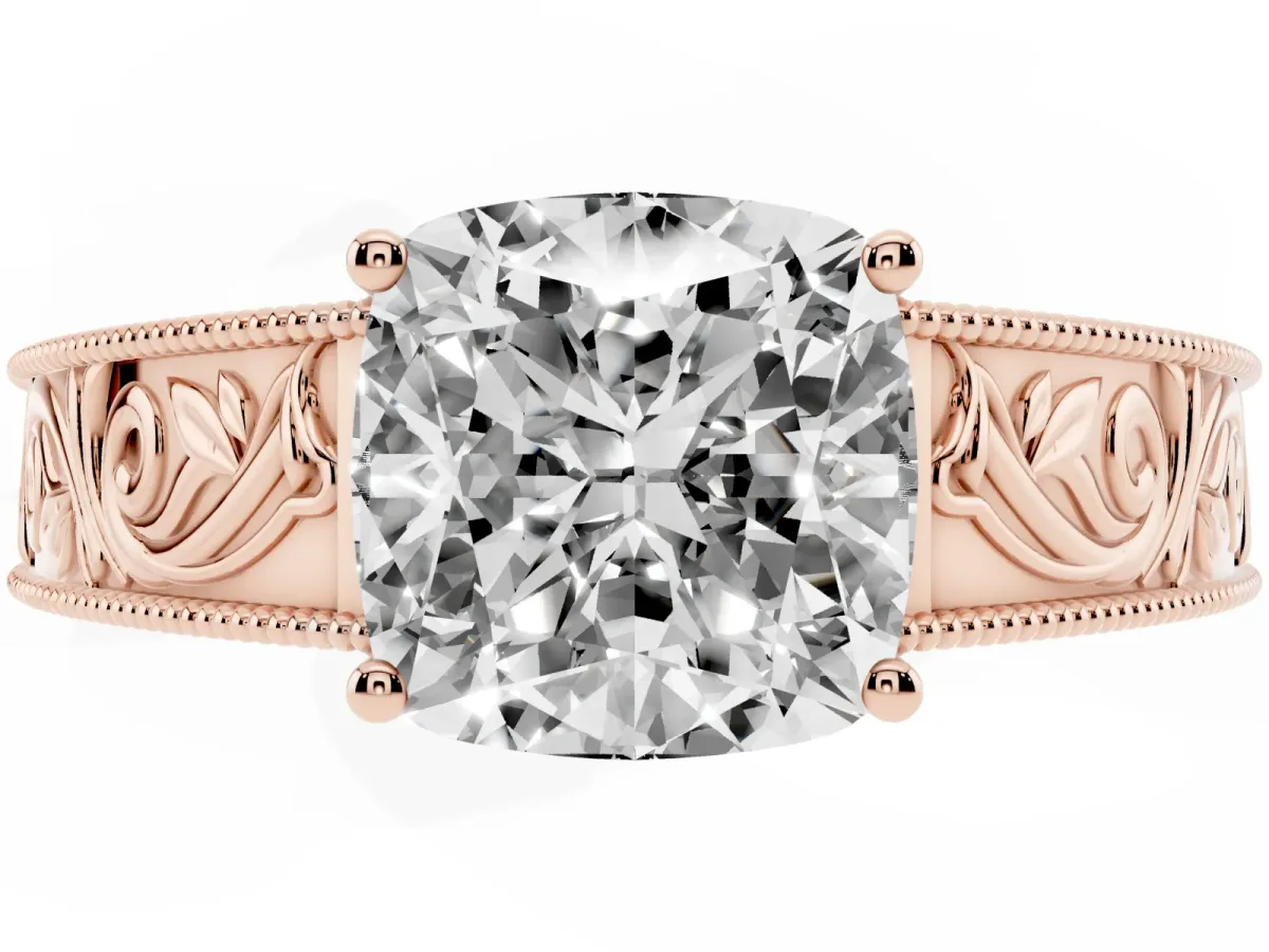 Cushion Cut Diamond Solitaire Ring with Engraved Band and Four-Prong Setting Rose gold