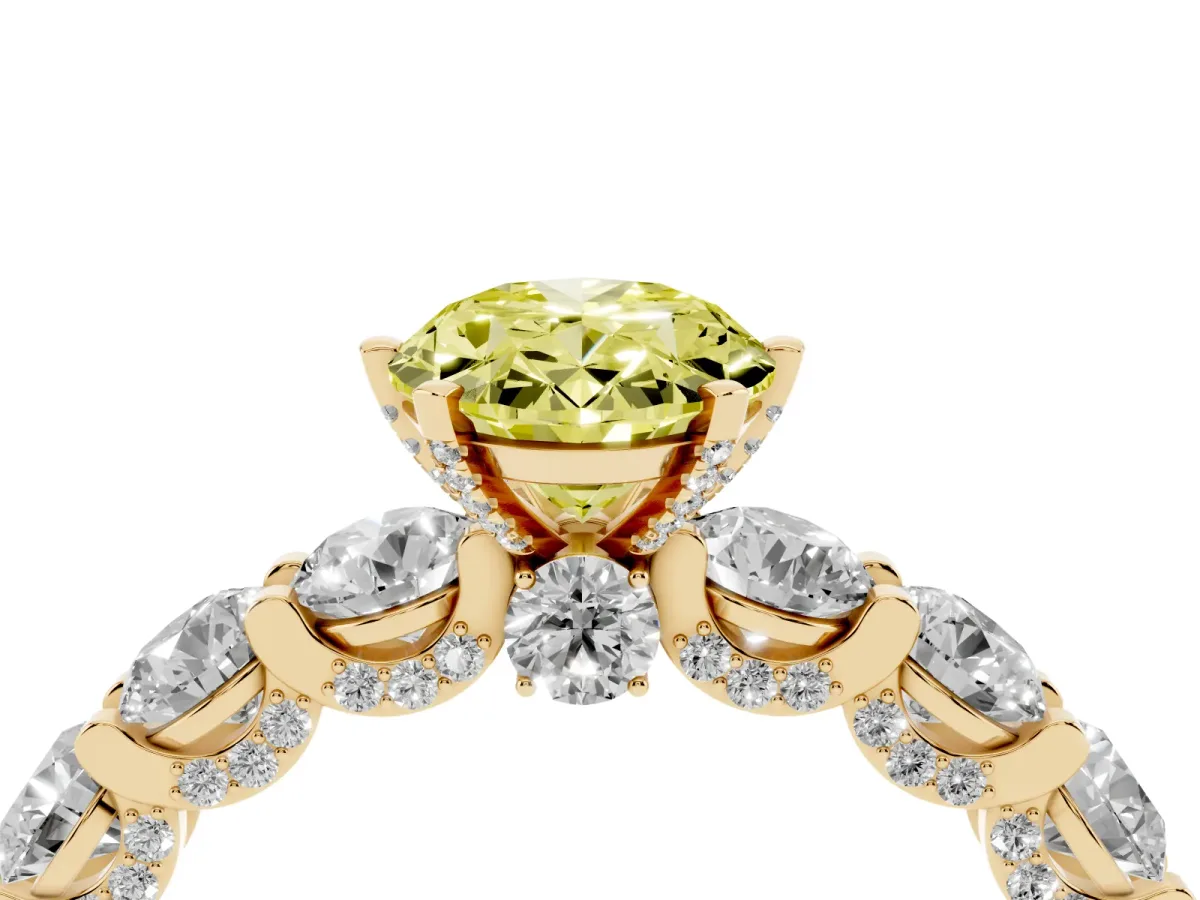 Fancy Yellow Oval Cut Diamond Side Stone Engagement Ring with Four-Prong Setting Yellow gold