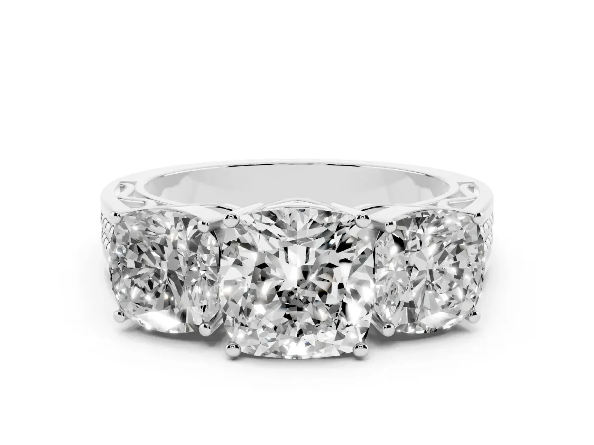 Cushion Cut Diamond Three-Stone Ring with Prong Setting and Textured Band Platinum