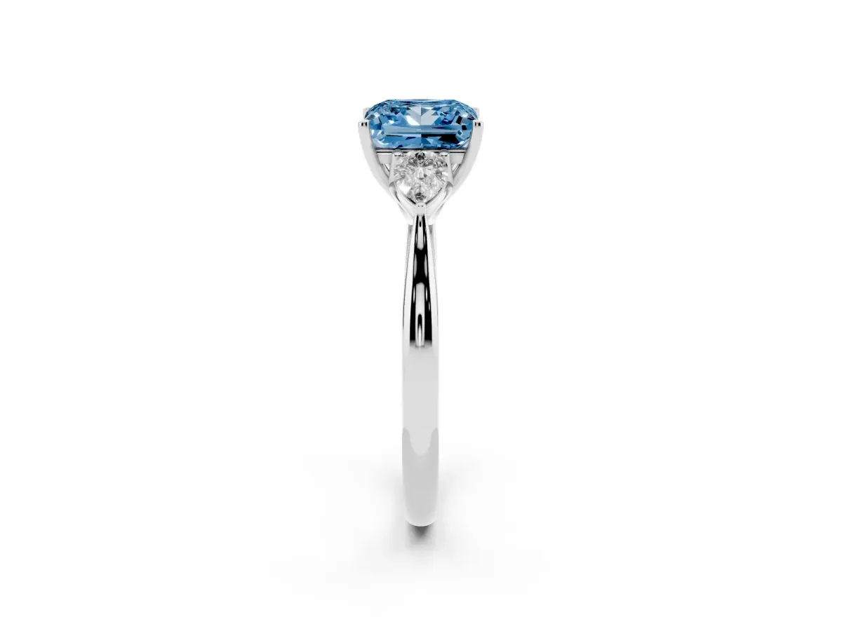 Fancy Blue Three-Stone Princess Cut Diamond Ring with Pear Side Stones in Four-Prong Setting Silver