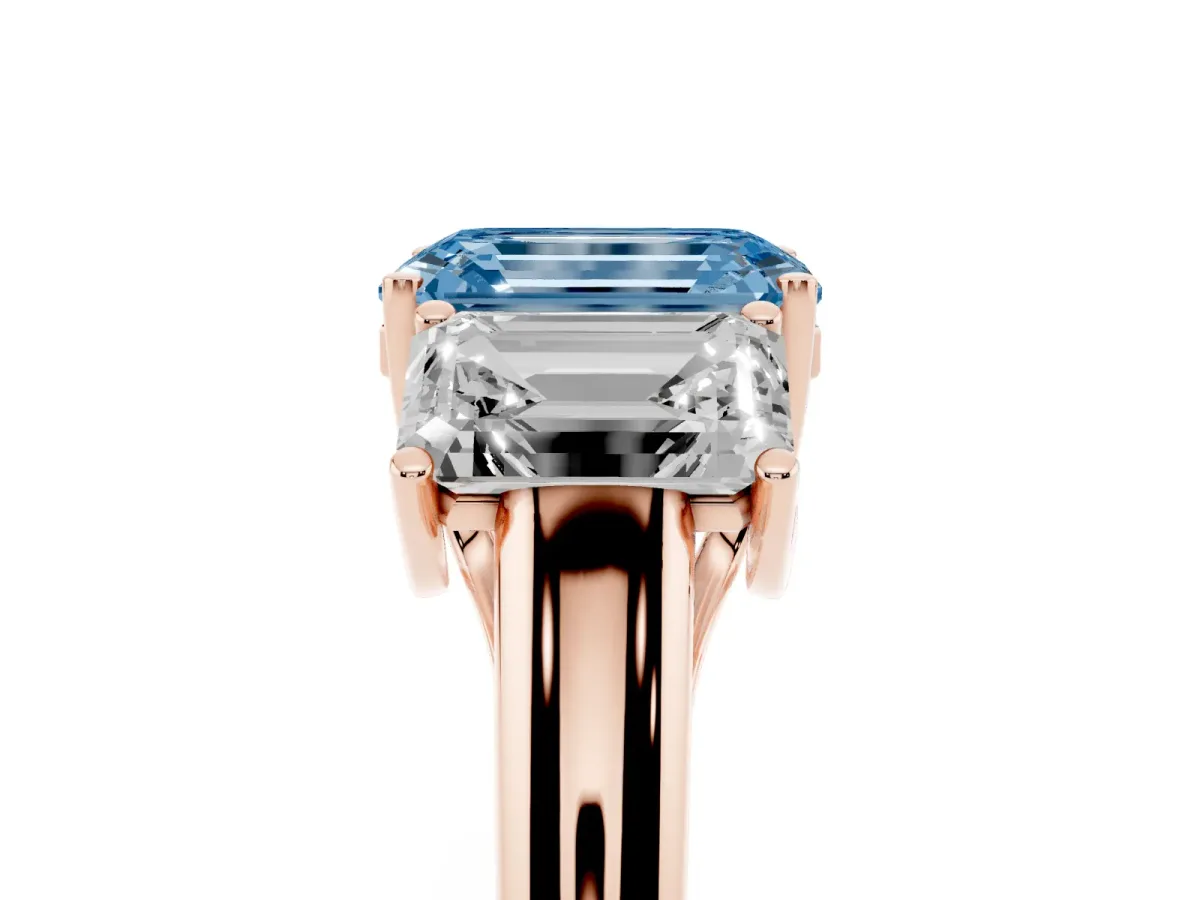 Fancy Blue Three-Stone Emerald Cut Diamond Engagement Ring with Prong Setting Rose gold