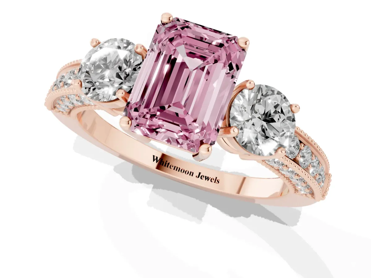 Fancy Pink Emerald Cut Three-Stone Diamond Ring with Pavé Band and Four-Prong Setting Rose gold